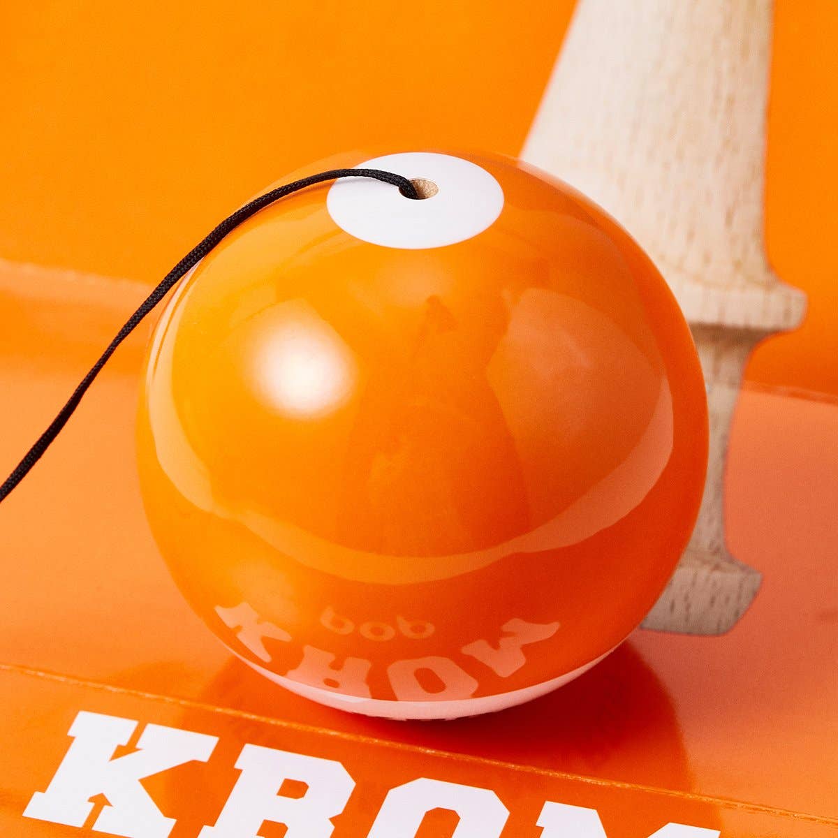 KROM · POP LOL ORANGE · KENDAMA